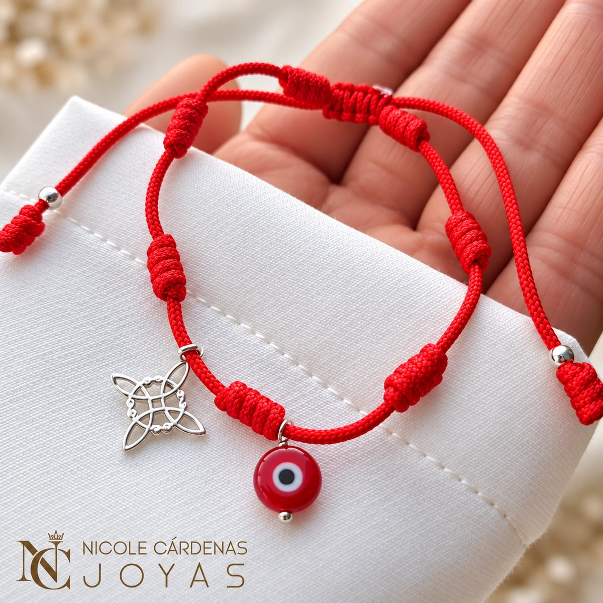 PULSERA HILO ROJO 7 NUDOS  OJO TURCO Y NUDO DE BRUJAS